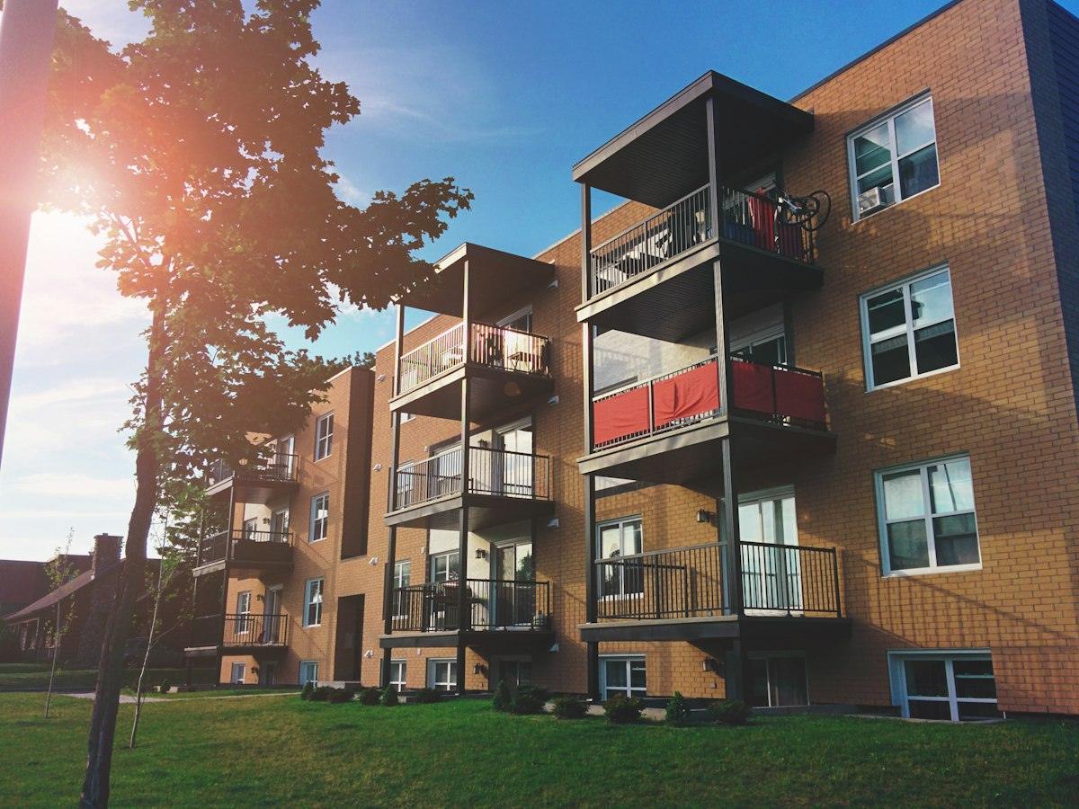 Apartment block with balconies in evening light